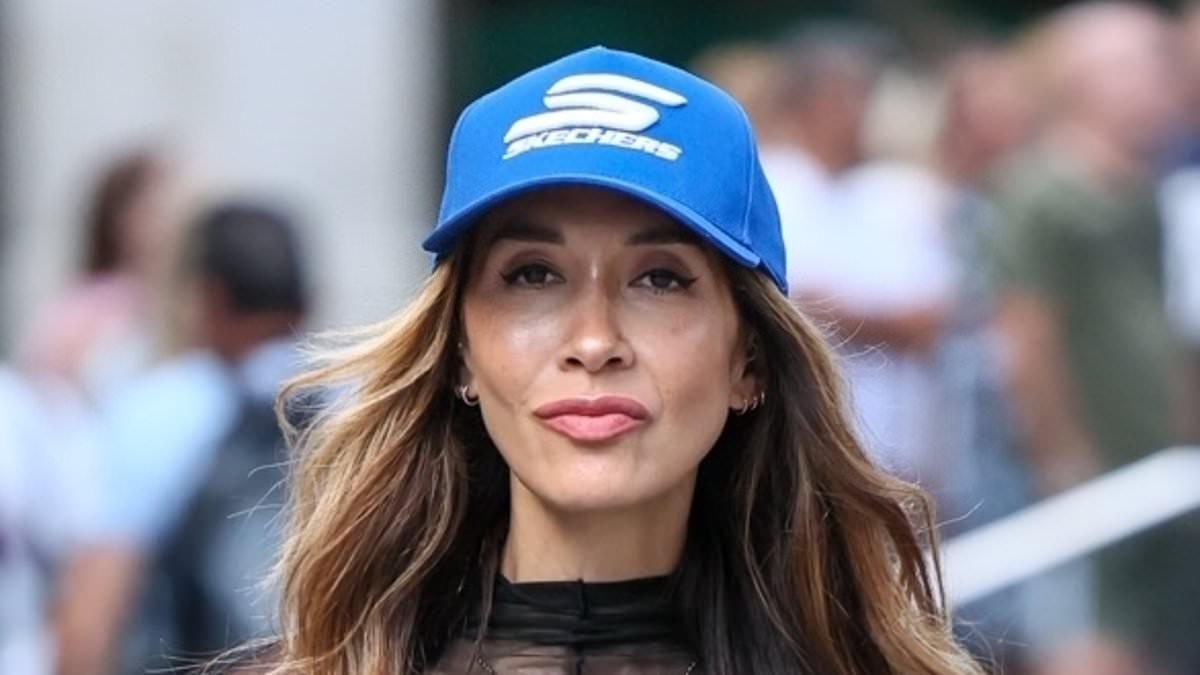 Myleene Klass shows off her toned figure in a mesh top and bold blue cargos as she arrives at Smooth Radio amid feud with Frankie Bridge and Rochelle Humes