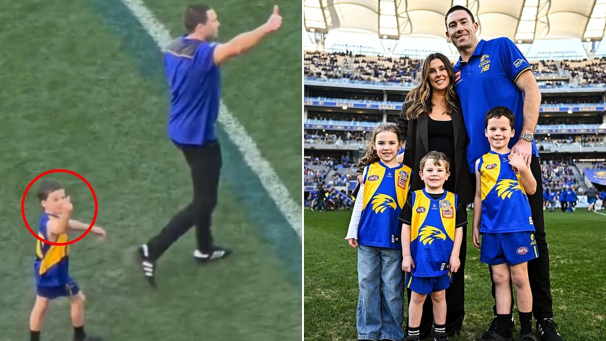 Most parents would be mortified if their little boy gave the middle finger to strangers. Here's why a footy star had a range of T-shirts made up when his son did it in front of thousands of fans