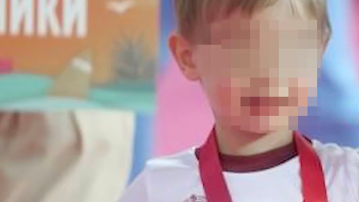 First photos 'of Putin's youngest son, six-year-old Vladimir Junior' are revealed - as it's claimed his private tutors earn $36,000 a month