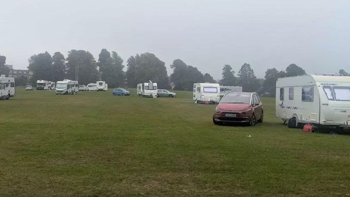Travellers with around 30 caravans pitch up in leafy Surrey park - and police are powerless to evict them