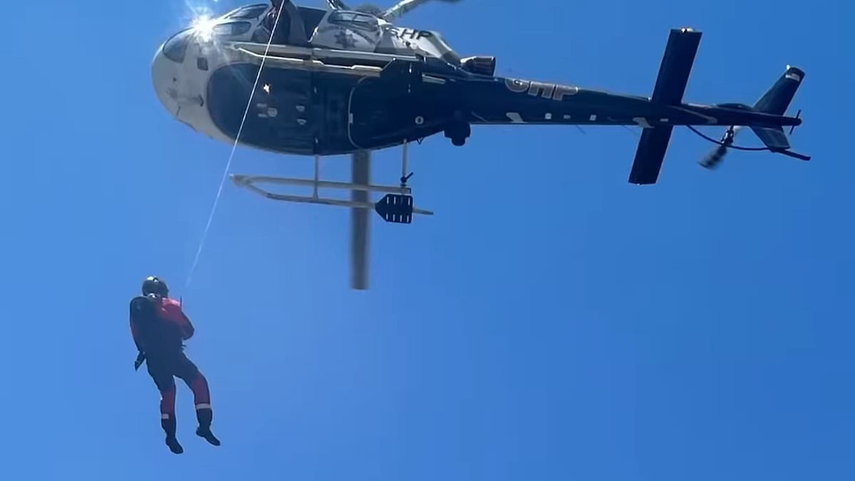 Hiker, 46, suffers dehydration after getting trapped behind enormous roaring waterfall for two days