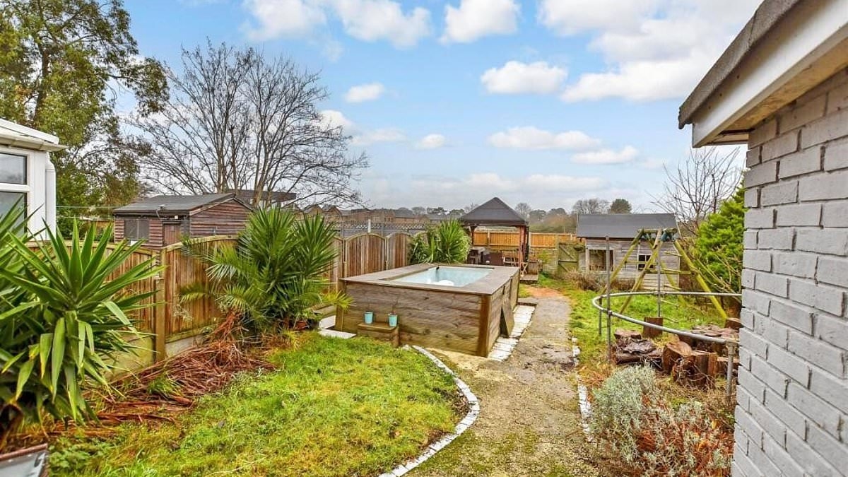 Wayne Couzens' marital home - with hot-tub he built in the garden- hits the market: Three-bed house where killer cop lived with wife and kids is on sale for £280K