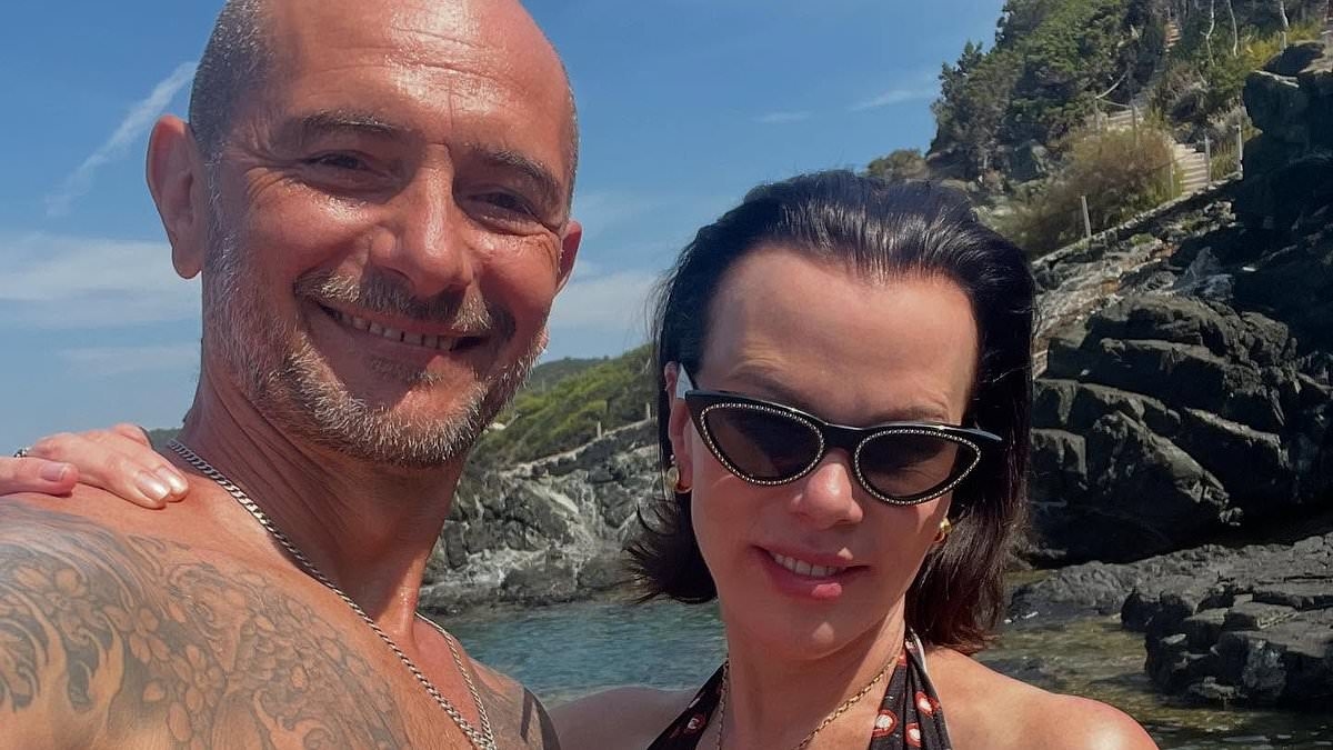 Goodfellas veteran Debi Mazar, 61, stuns in a swimsuit as her husband of 23 years calls her his 'obsession'