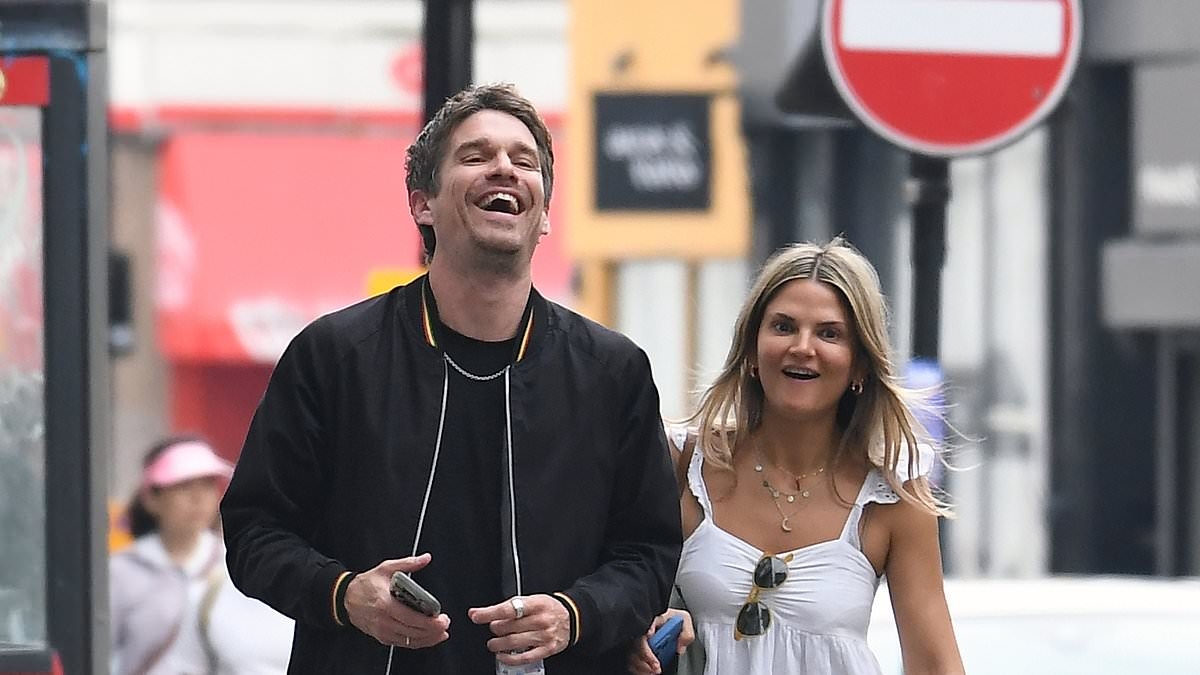 Fearne Cotton's ex Jesse Wood can't wipe the smile off his face as he enjoys romantic stroll with Made in Chelsea star girlfriend Gemma Gregory - after the presenter moved on with Rivals director