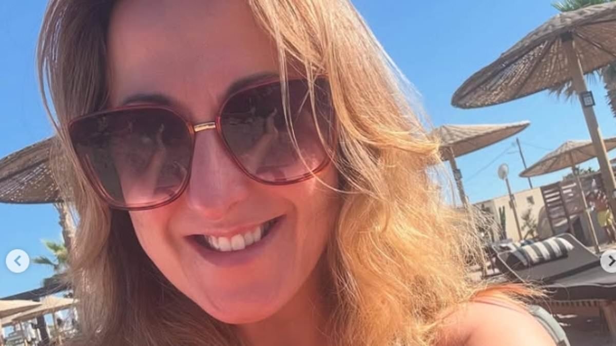 EastEnders star Natalie Cassidy, 41, looks slimmer than ever as she shows off her physique in a patterned bikini during family trip to Greece