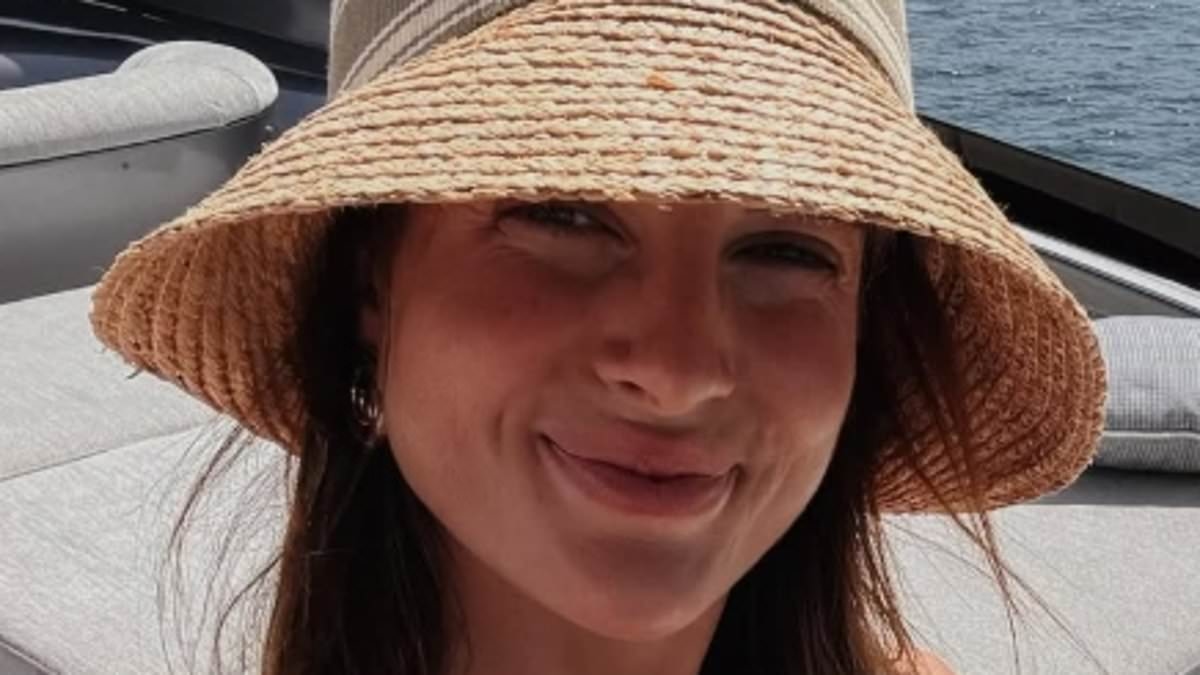 Binky Felstead displays her washboard abs in a skimpy bikini as she enjoys a lavish trip with partner Max Darnton