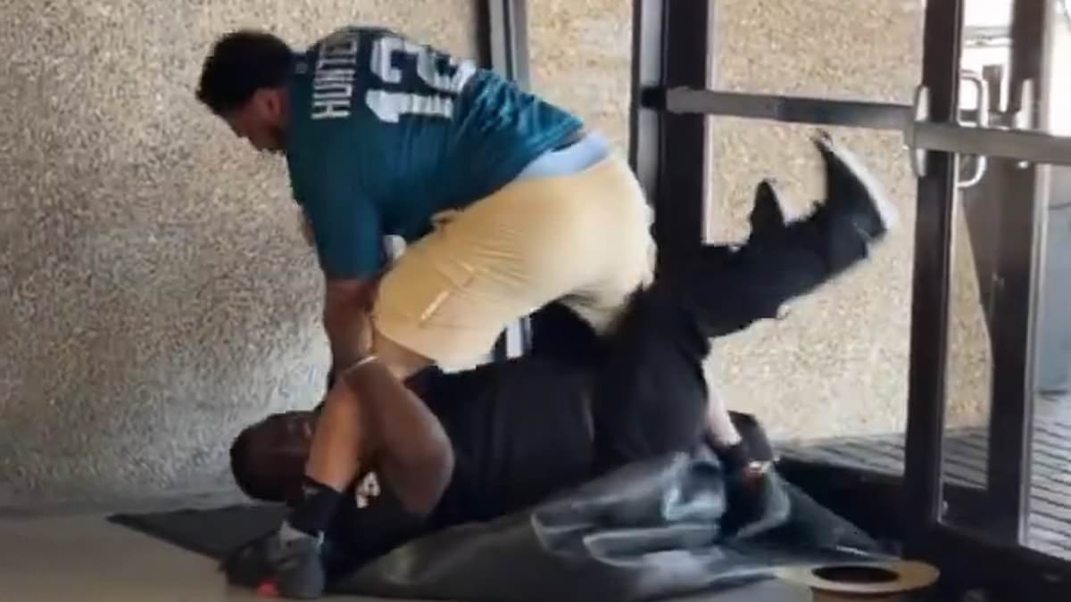Man loses his pants in shocking concourse fist-fight with rival NFL fan