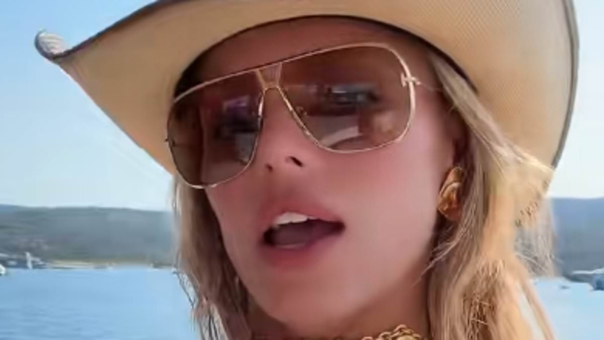 Brooks Nader laughs off X-rated wardrobe malfunction in plunging dress during ritzy yacht trip