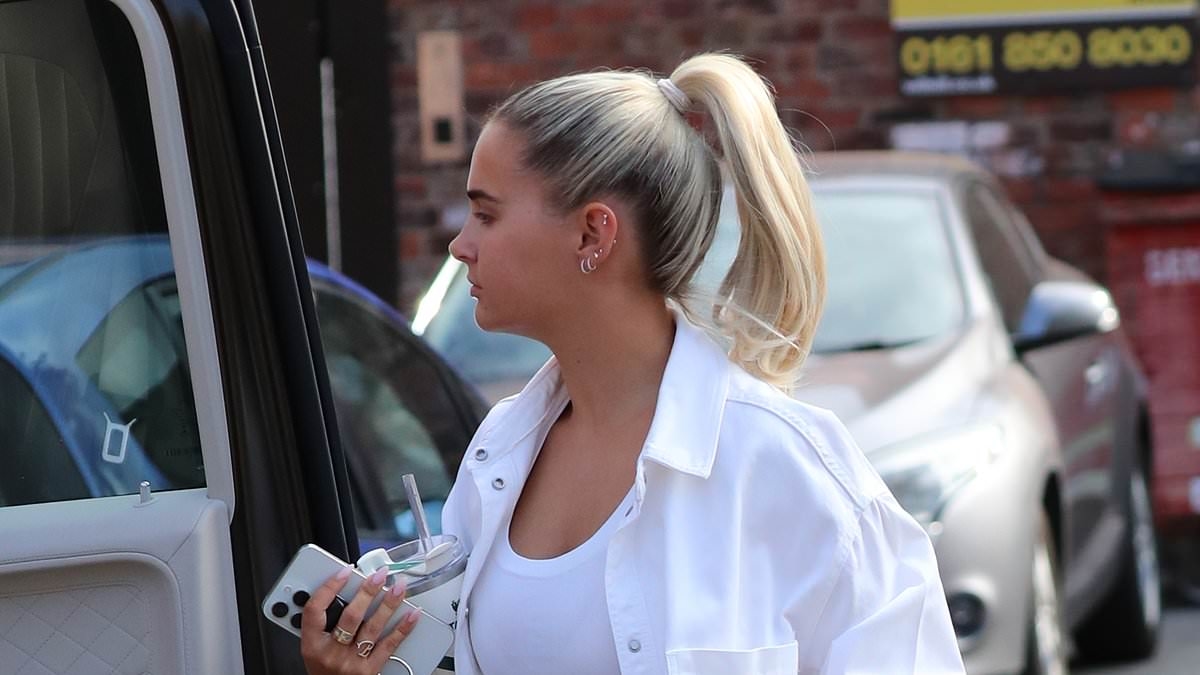 Molly Mae Hague racks up ANOTHER parking ticket as she is spotted peeling her sixth fine of the year off her £200K G Wagon - after Tommy Fury addressed split in BBC docuseries