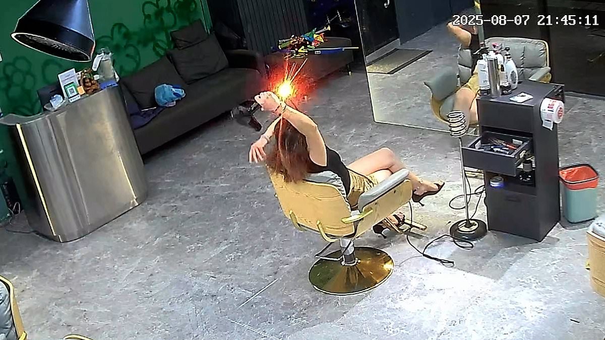 Terrifying moment hair dryer EXPLODES in woman's hand at salon