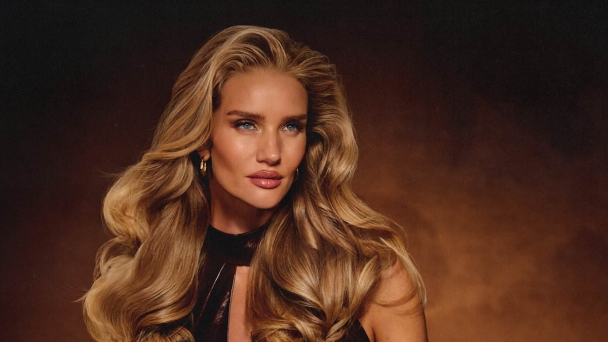 Rosie Huntington-Whiteley shows off bouncy blow dry as she is unveiled as new ambassador of haircare brand Gisou