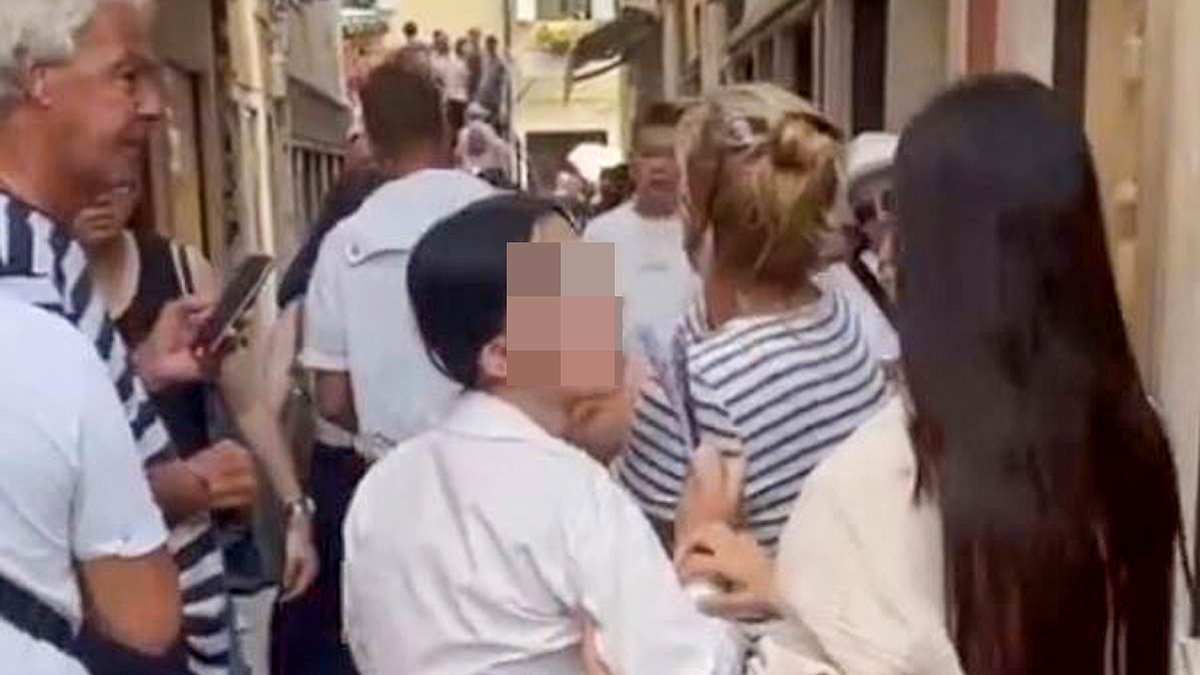 Moment irate US tourist grabs 14-year-old female 'pickpocket' by the ponytail and tells her 'you're not getting away' before police arrest young thief in Venice