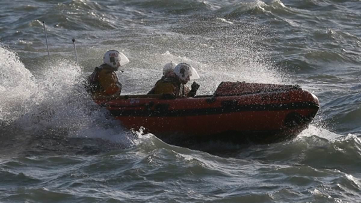 Woman on inflatable crocodile and teenagers on blow-up mattress have to be rescued after 'being blown out to sea'