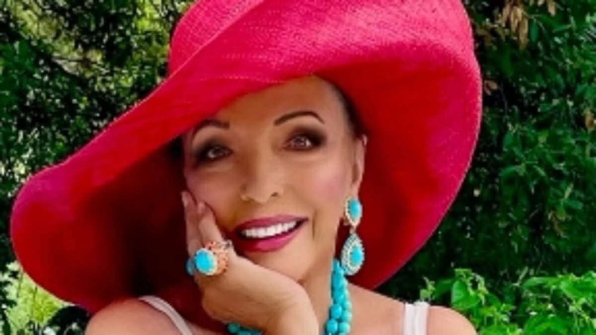 Joan Collins, 92, flaunts her incredible figure in a chic white swimsuit as she basks in the sunshine in stunning snap in St Tropez