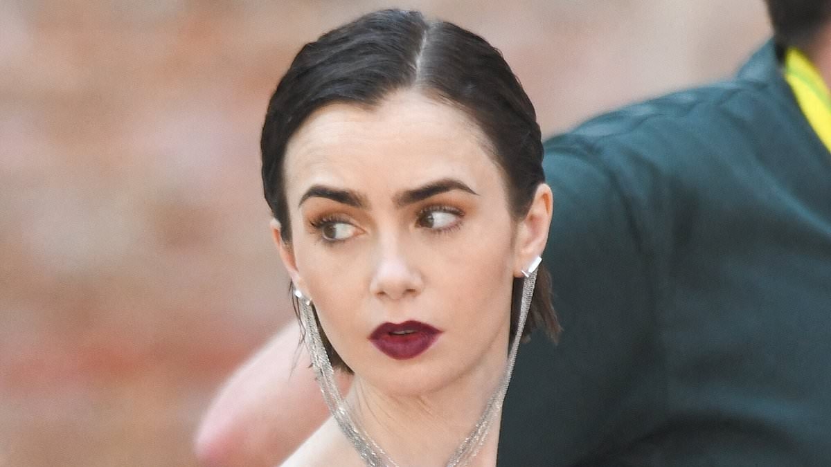Lily Collins looks effortlessly chic in a leggy black and white polka dot dress as she continues filming Emily In Paris season five in Venice