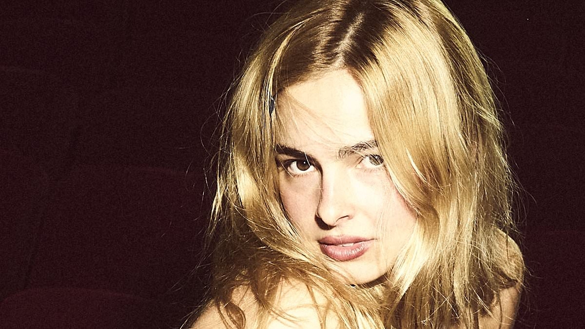 Addison Rae goes topless as she follows Sydney Sweeney in promoting a jeans brand