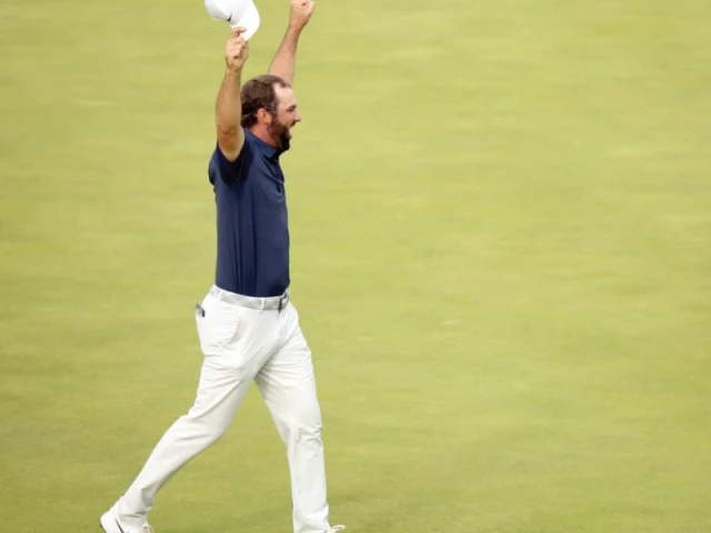 Scheffler cruises to British Open title