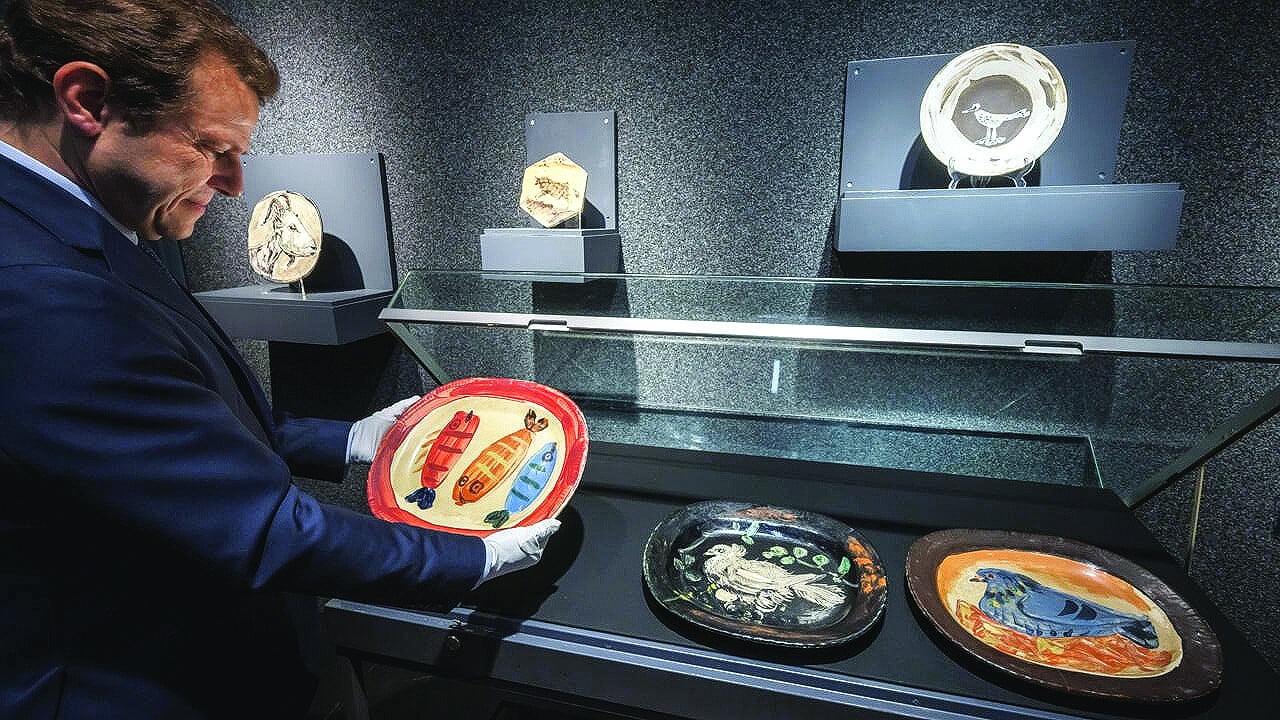 Plates, pastels, and palette of blue