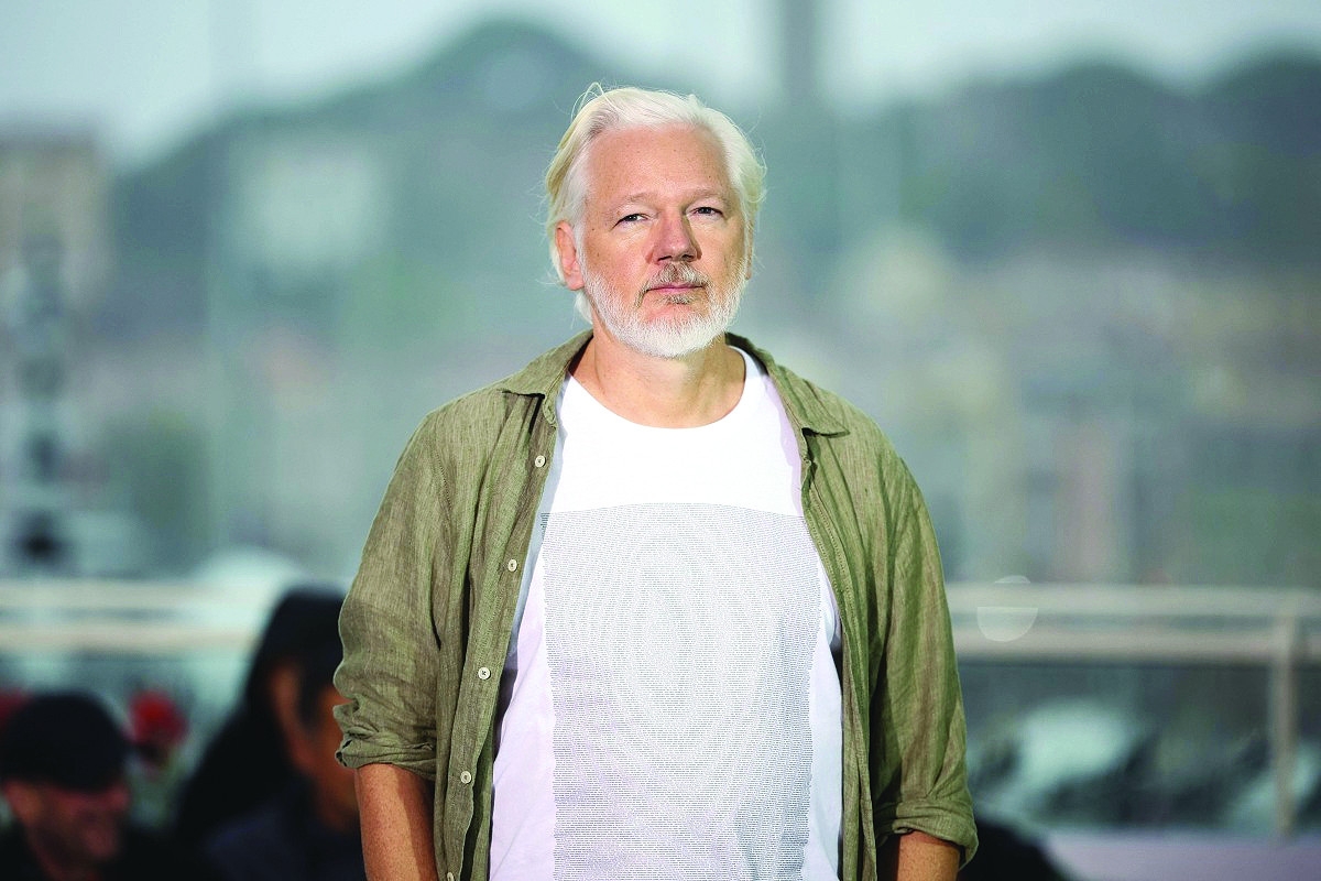 Assange unveils Cannes film