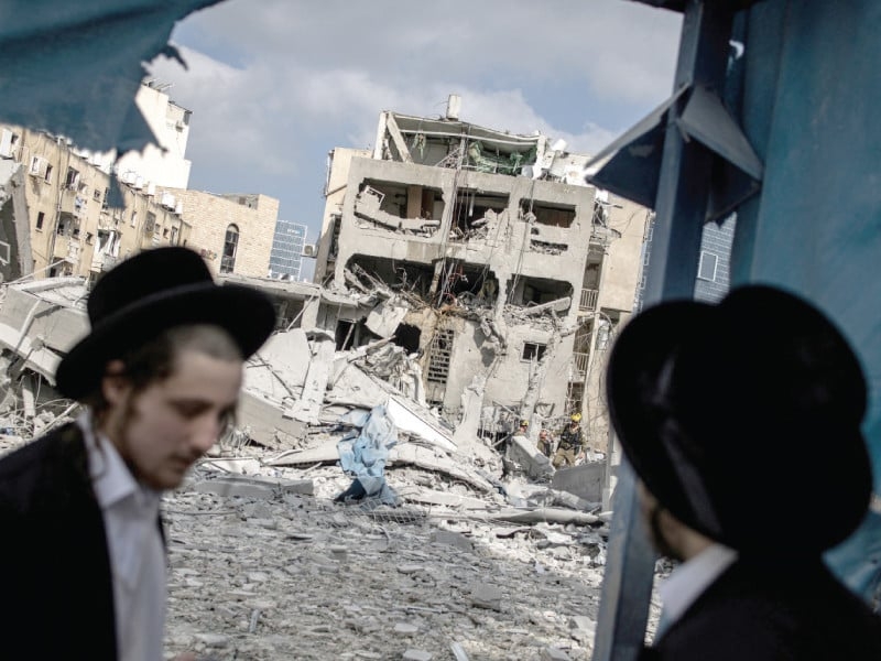 Iranian missiles pierce through Israeli air defences