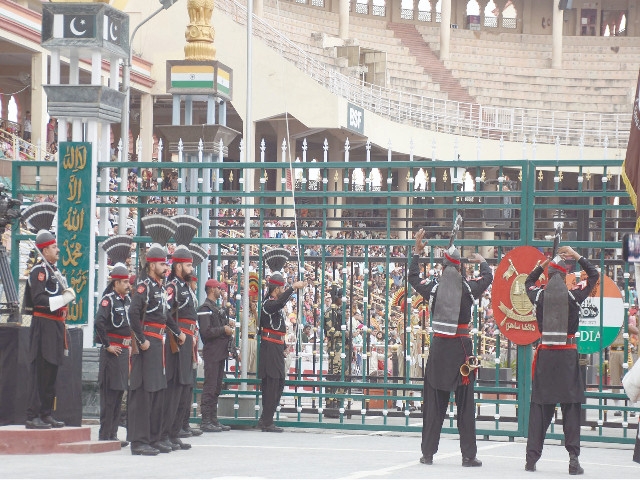 Tensions fail to dampen zeal at border ceremonies