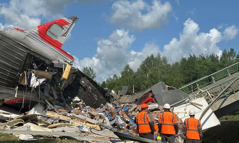 Explosions collapse two bridges in Russia, killing seven as passenger train derails