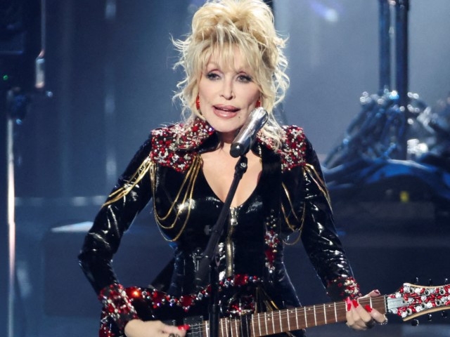 Dolly Parton urges Indiana governor to restore funding for Imagination Library