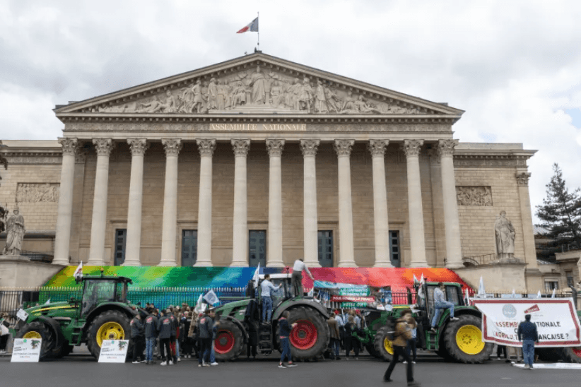 French farmers protest in Paris over bill easing farm rules