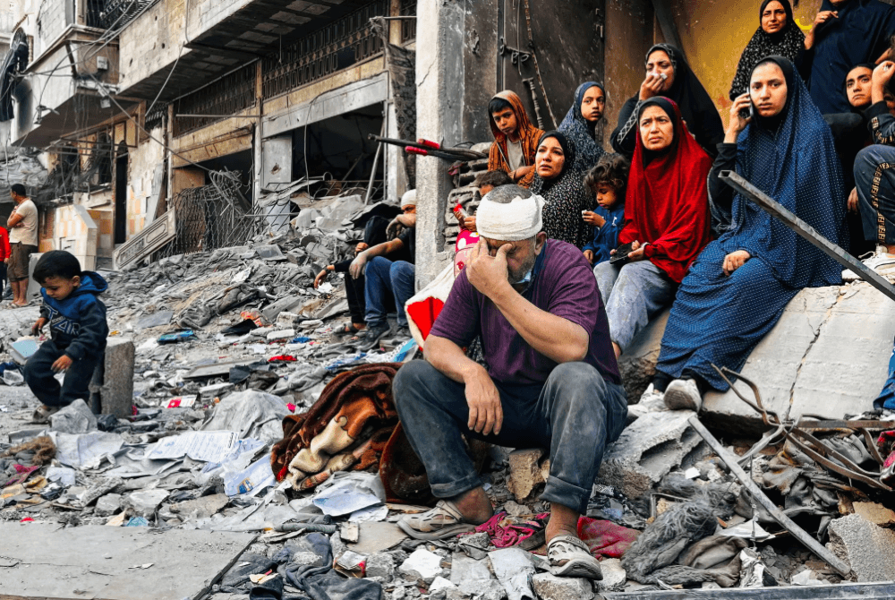 Israel kills at least 72 in Gaza strikes, including 21 near aid sites