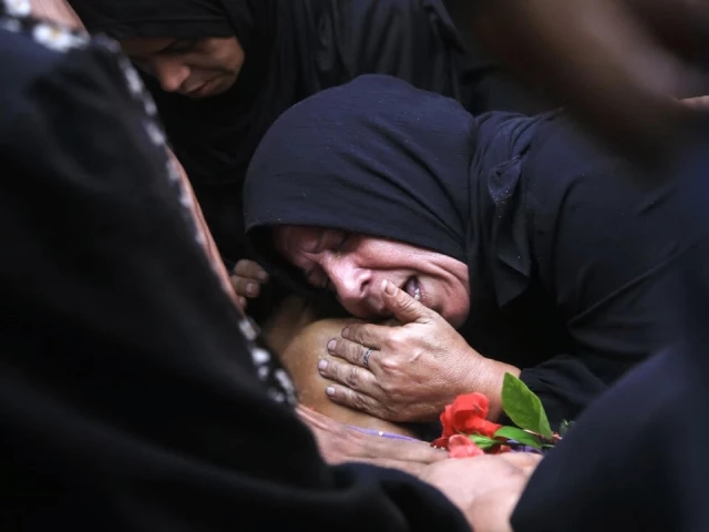 Israel kills 32 near two aid centres in Gaza