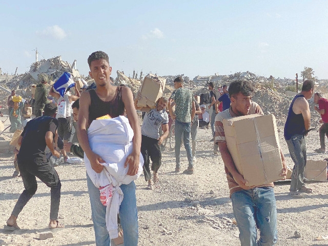 Palestinians storm US-backed aid centres