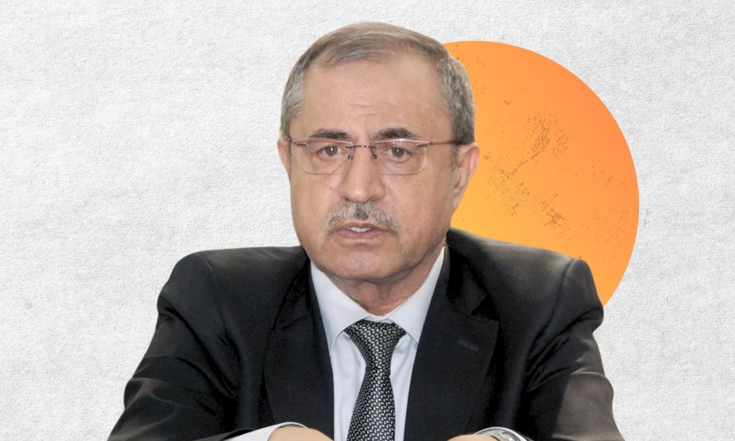 Assad-era minister turns himself in