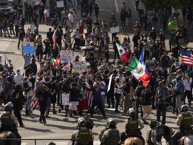 Trump's parade rolls through D.C. amid protests and political violence