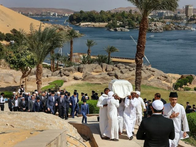 Why was Aga Khan IV laid to rest in Egypt's Aswan?"