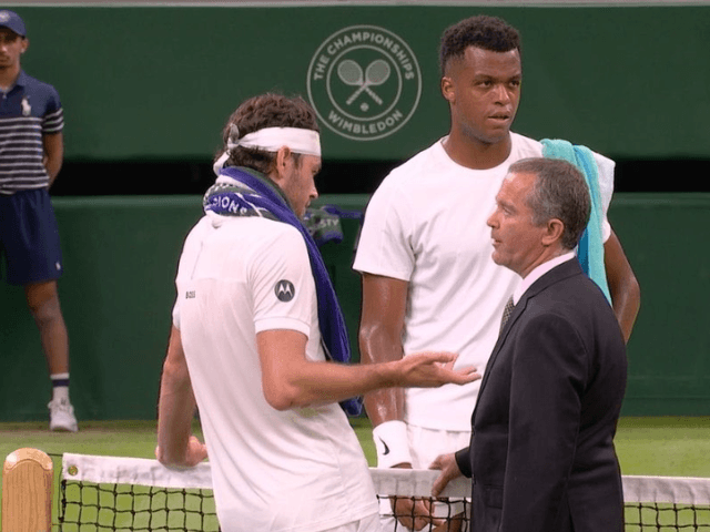 Wimbledon crowd boo as organisers suspend Taylor Fritz match against Giovanni Mpetshi Perricard