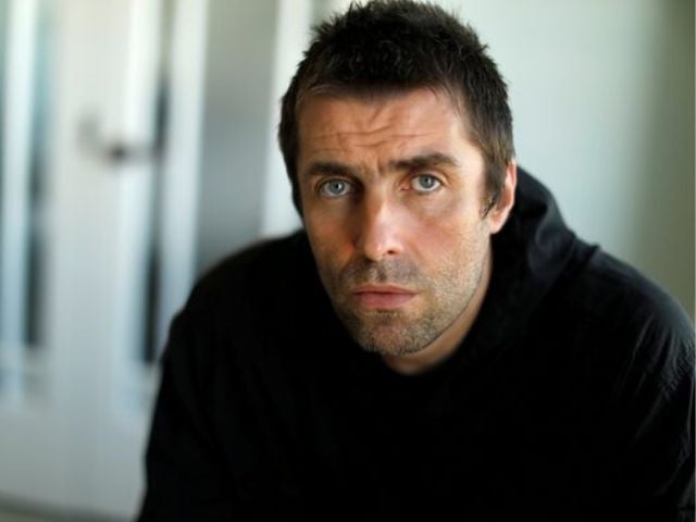 Liam Gallagher issues apology after backlash over racist tweet