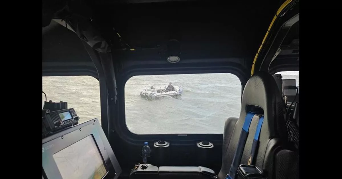 Video shows moment three people miles out to sea on tiny boat are spotted