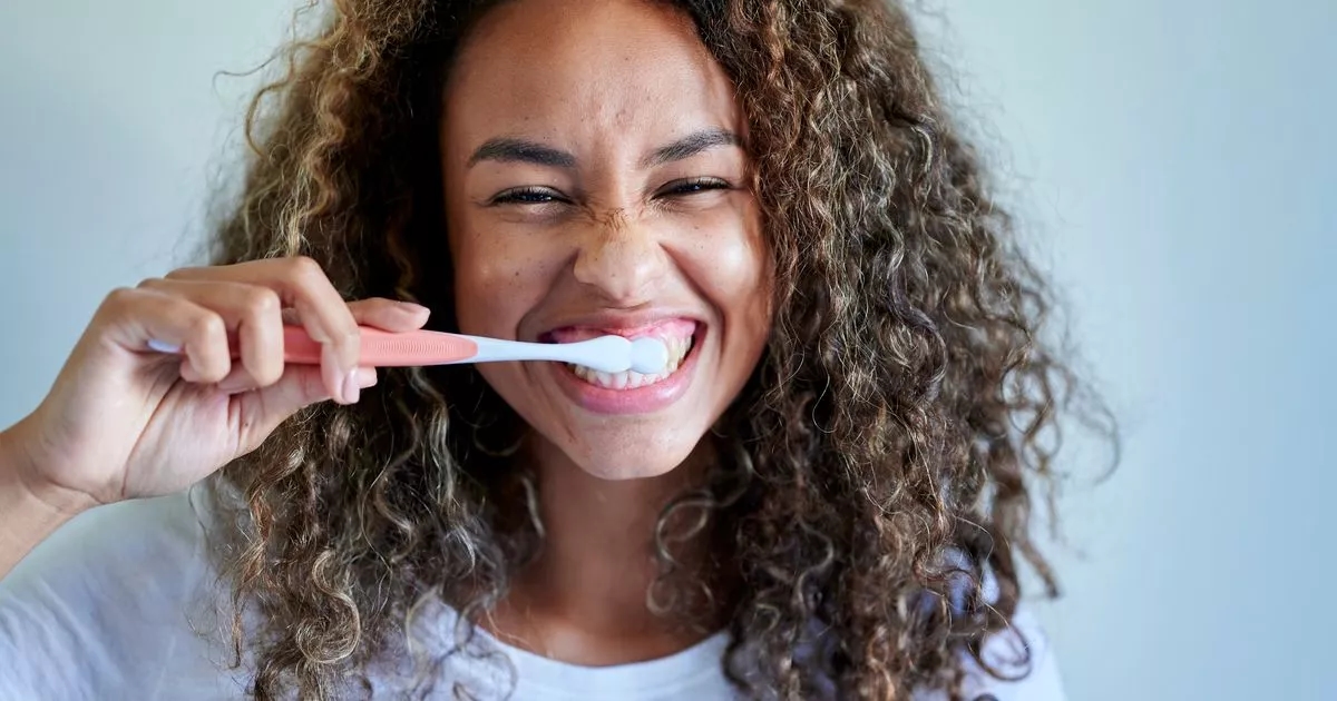 Dentist's warning over common brushing habit that could actually discolour teeth