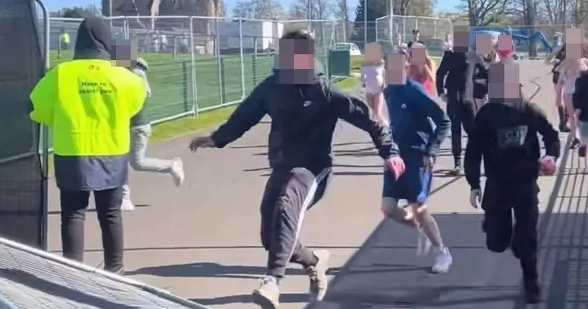 Moment brazen ticketless youths leap fence at Terminal V festival