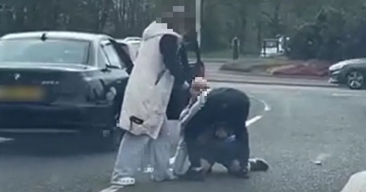 Moment men brawl outside Asda caught on camera in Scots 'road rage' street fight