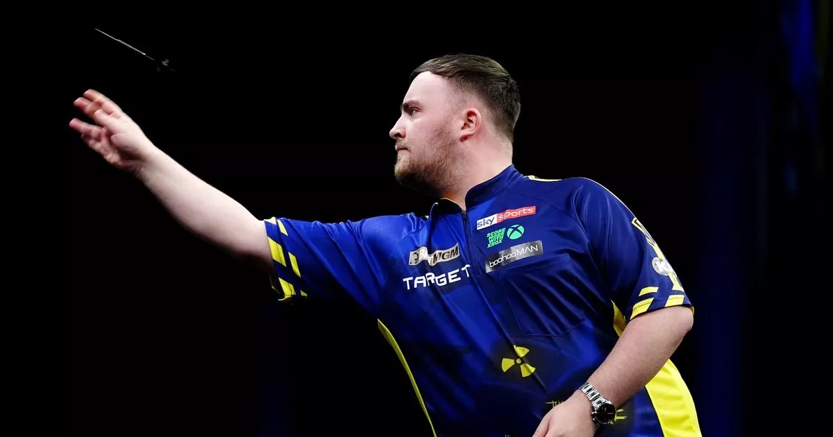 Luke Littler dodges flying object and hit by foam finger before surge to Final