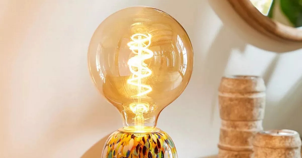 Next shoppers easily add 'pop of colour' to home with 'quirky' £30 table lamp