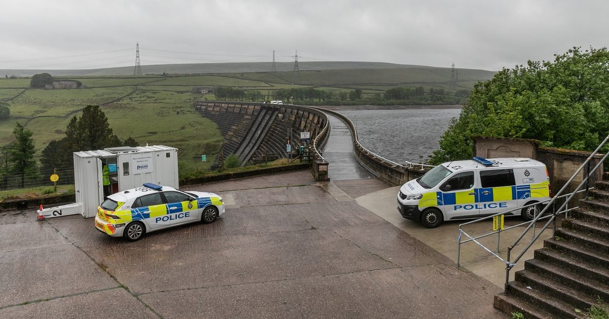 Major search for girl who fell into reservoir while 'taking photos with dad'