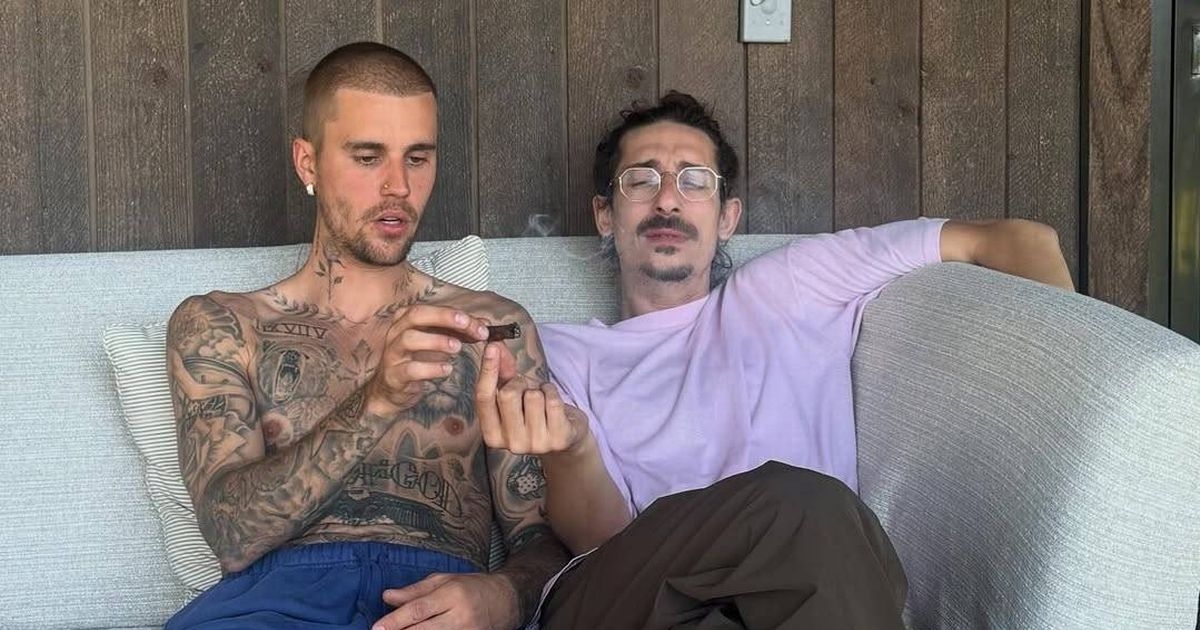 Justin Bieber fans slam singer for 'smoking roll-up in front of baby son' in new photos
