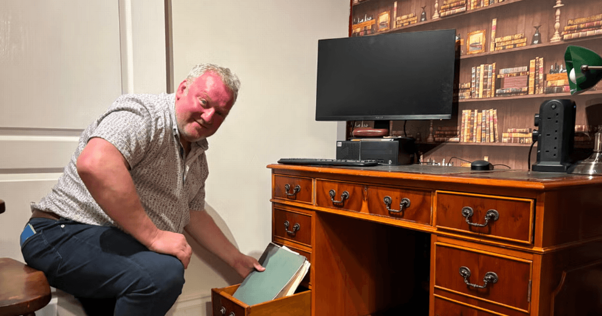 Son reunited with hero dad's WW2 documents hidden in old desk