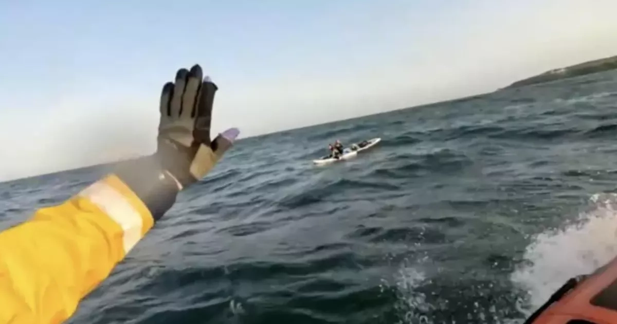 RNLI crew in dramatic rescue of four paddleboarders in North Sea