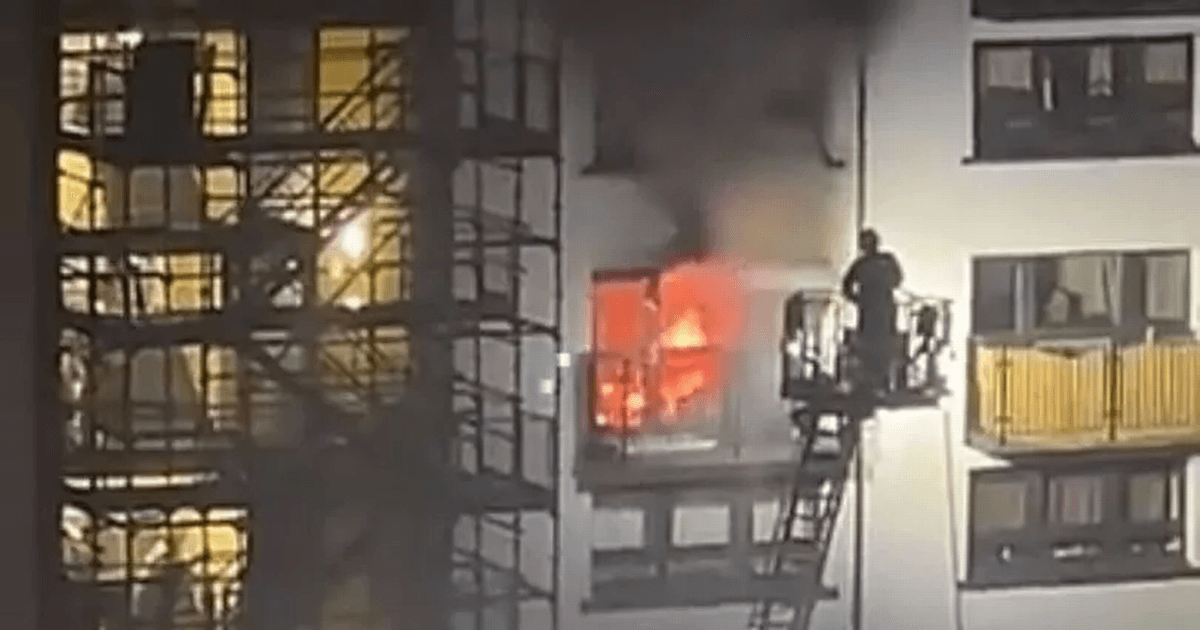 Flames tear through Edinburgh flat as dozens of firefighters battle blaze