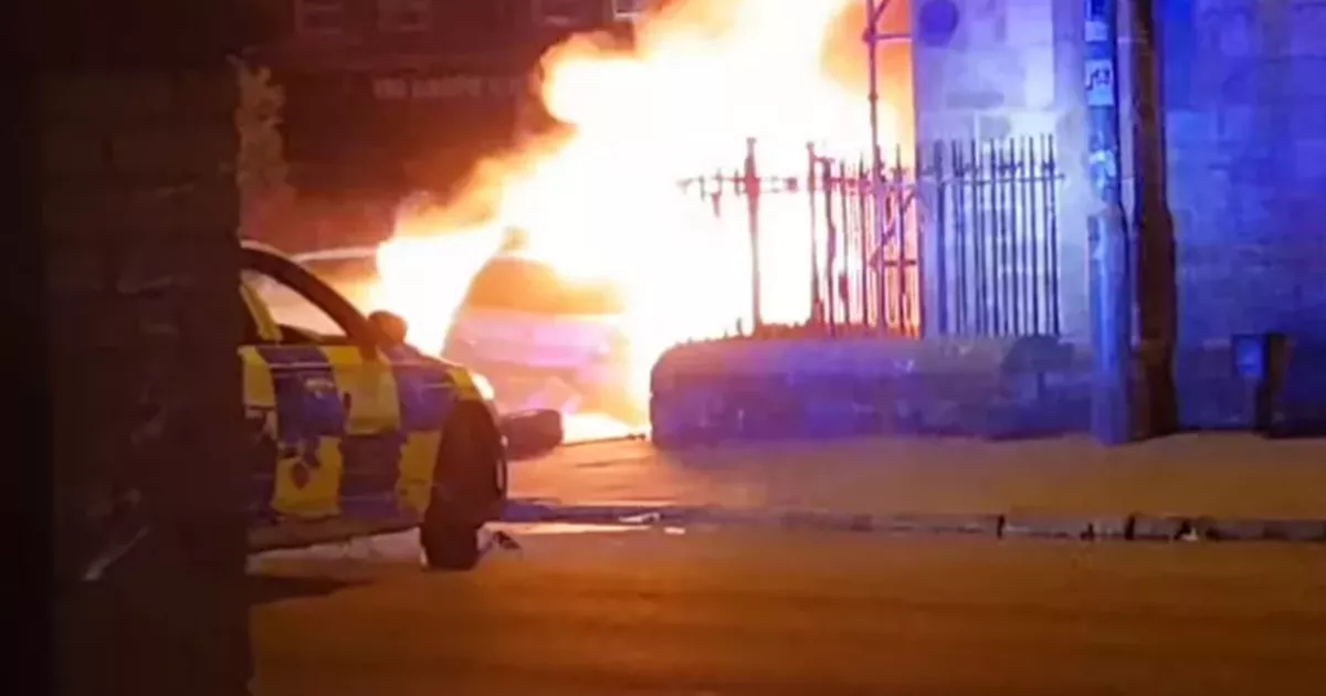 'Abandoned' car bursts into flames after Glasgow crash as man charged