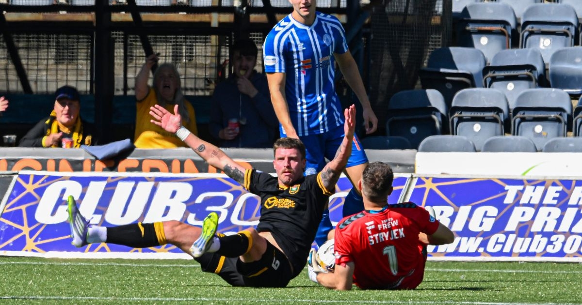 Ten man Kilmarnock throw away two goal lead in season opening draw with Livingston