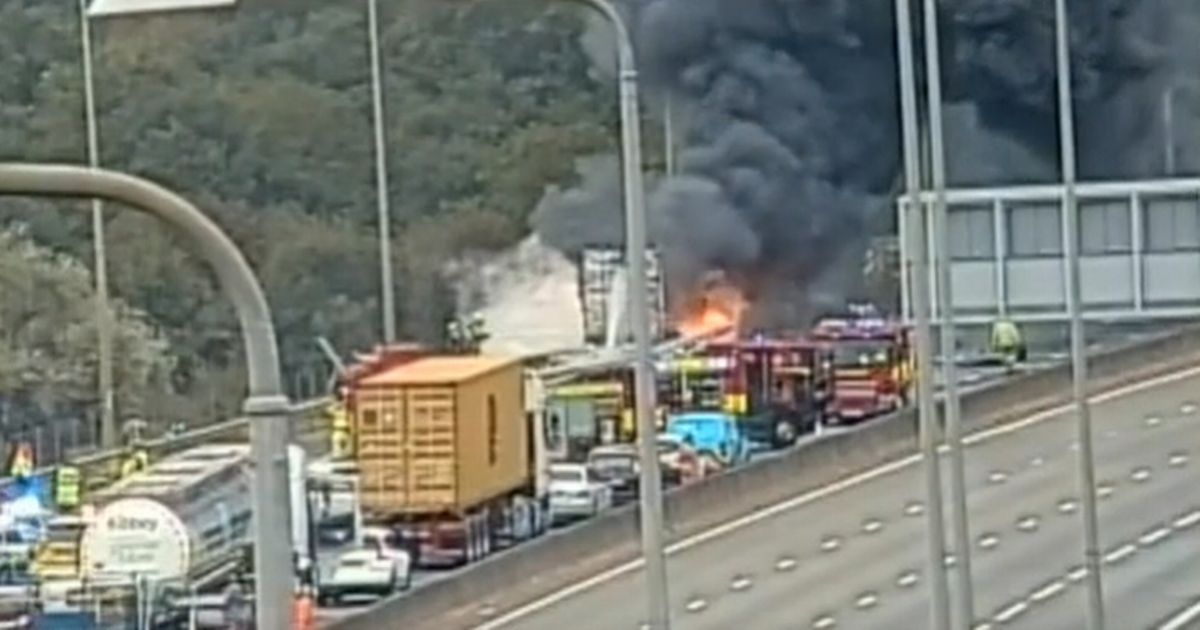 Major lorry fire closes M25 in both directions as smoke and flames fill the sky